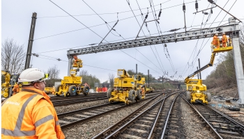 Picture of Rail employee on site on the train tracks.